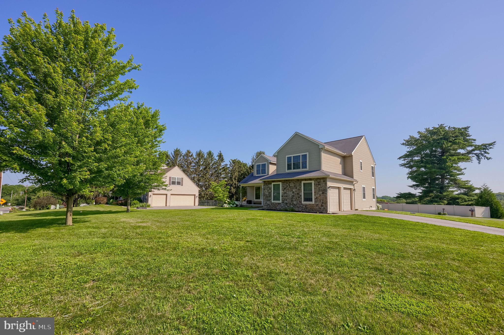 631 Owl Hill Road Lititz, PA 17543 - Photo 53 of 56 a view of a house with a big yard and large trees