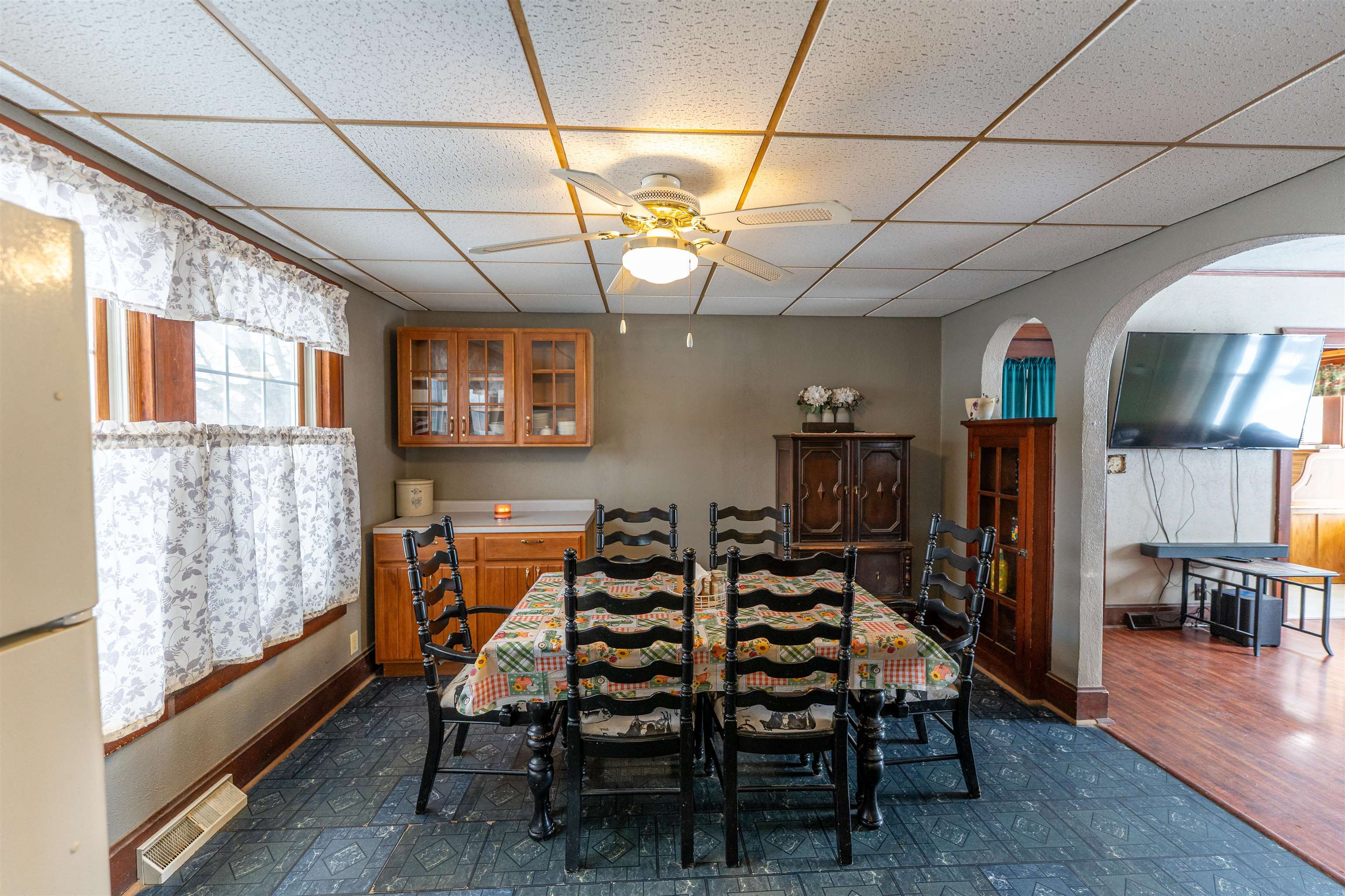 7965 North Adeline Road Leaf River, IL 61047 - Photo 12 of 90 a view of a dining room with furniture window and wooden floor