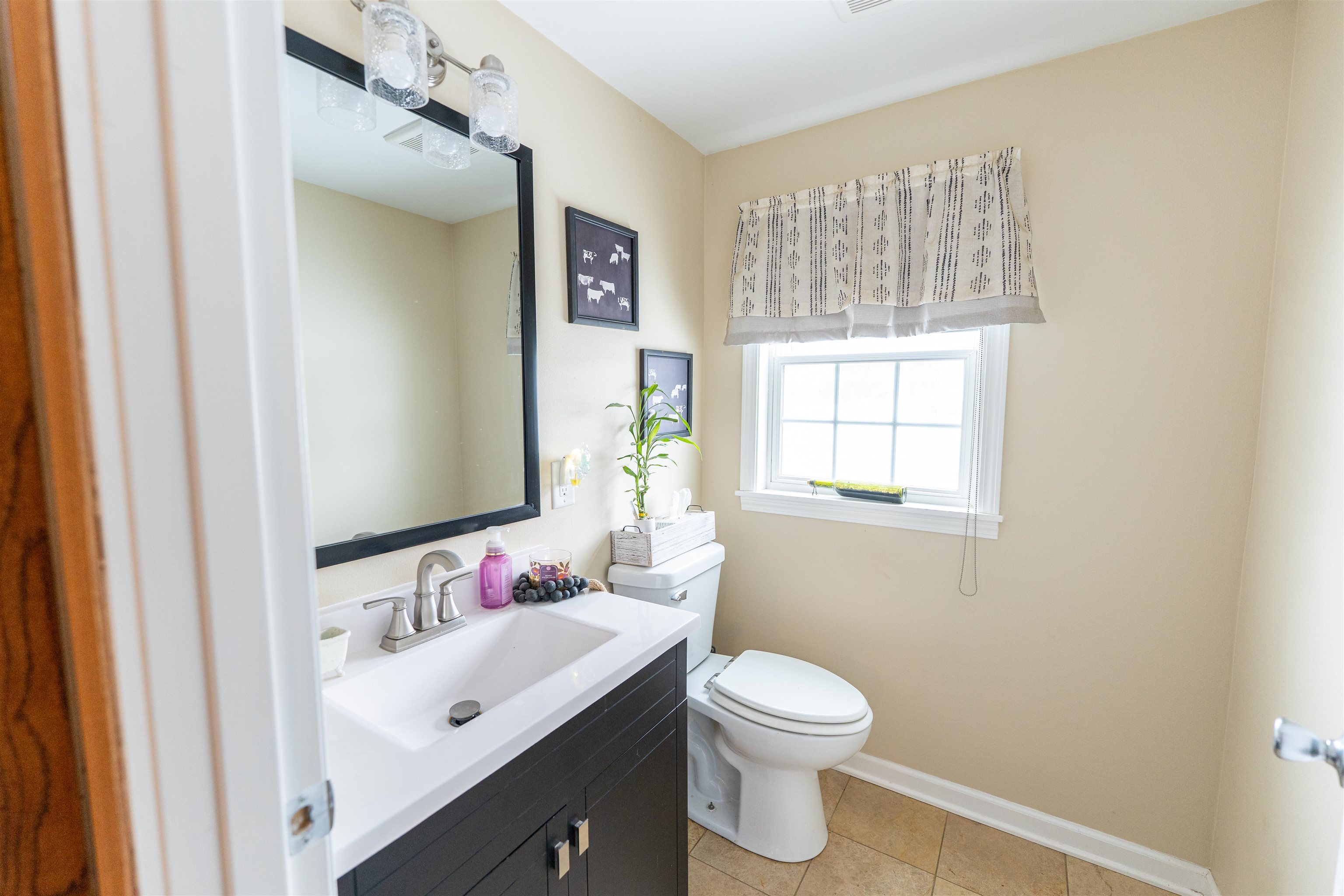 7965 North Adeline Road Leaf River, IL 61047 - Photo 14 of 90 a bathroom with a sink vanity granite and toilet
