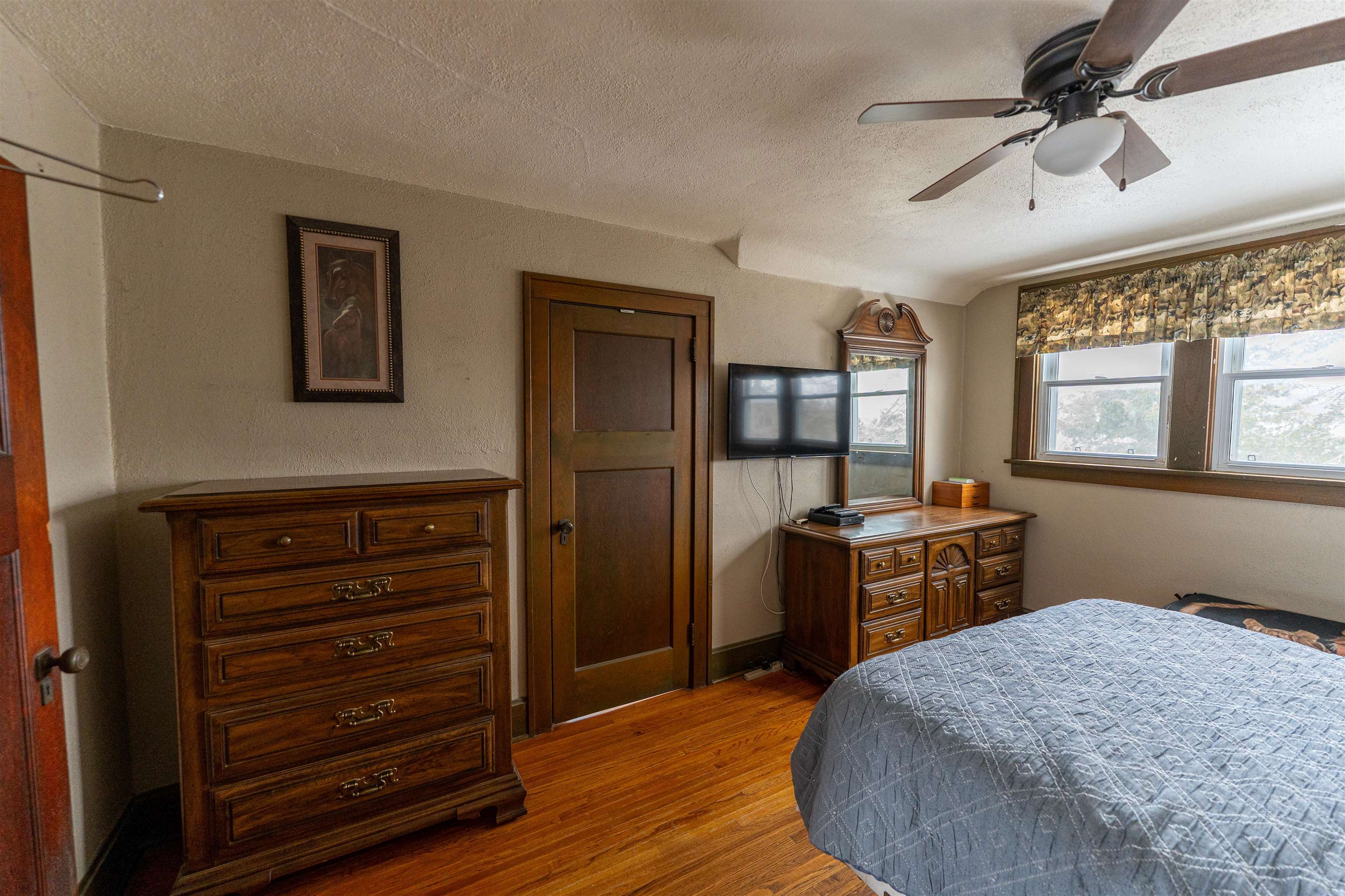 7965 North Adeline Road Leaf River, IL 61047 - Photo 31 of 90 a bedroom with a bed and wooden floor
