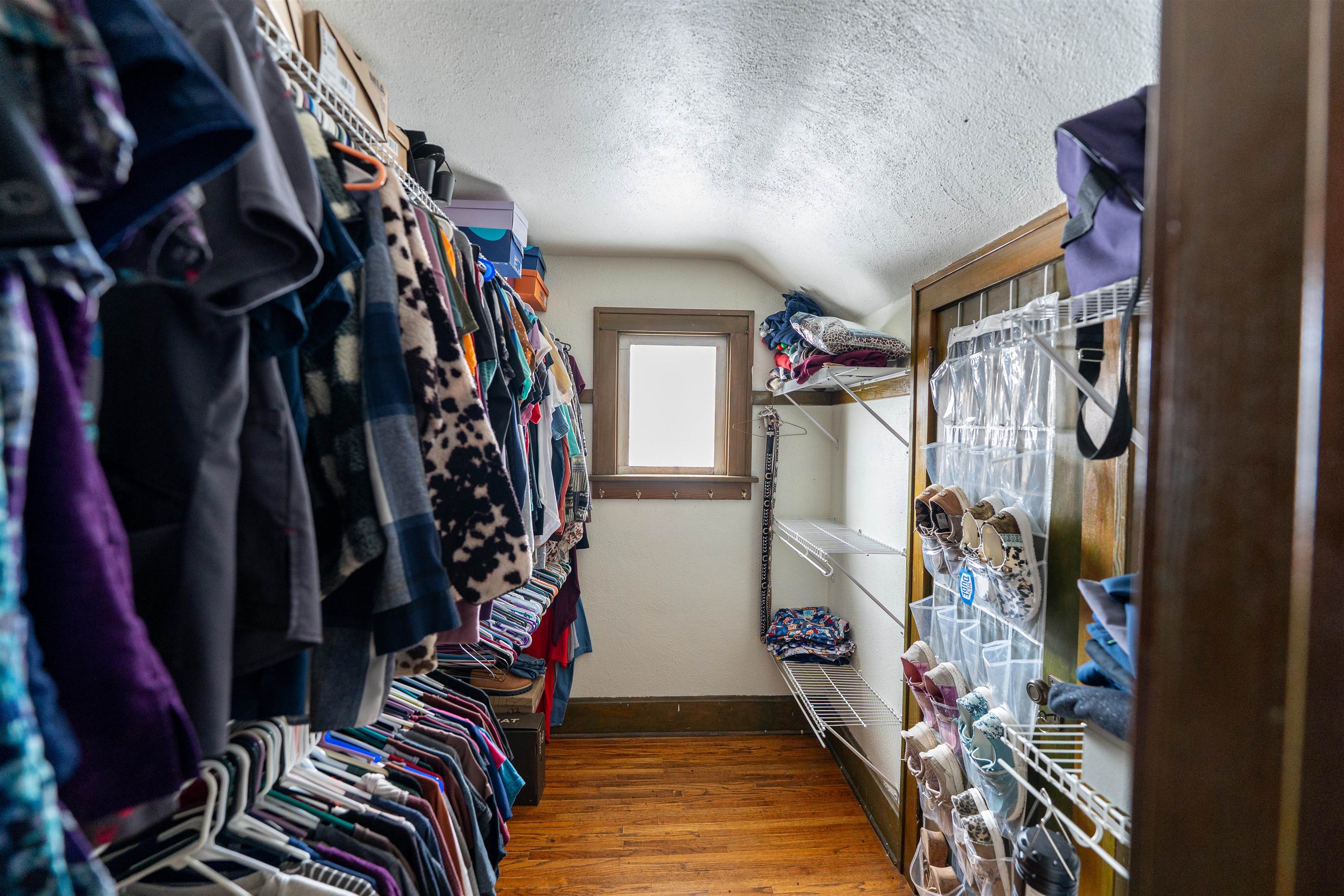 7965 North Adeline Road Leaf River, IL 61047 - Photo 32 of 90 a view of walk in closet with clothes