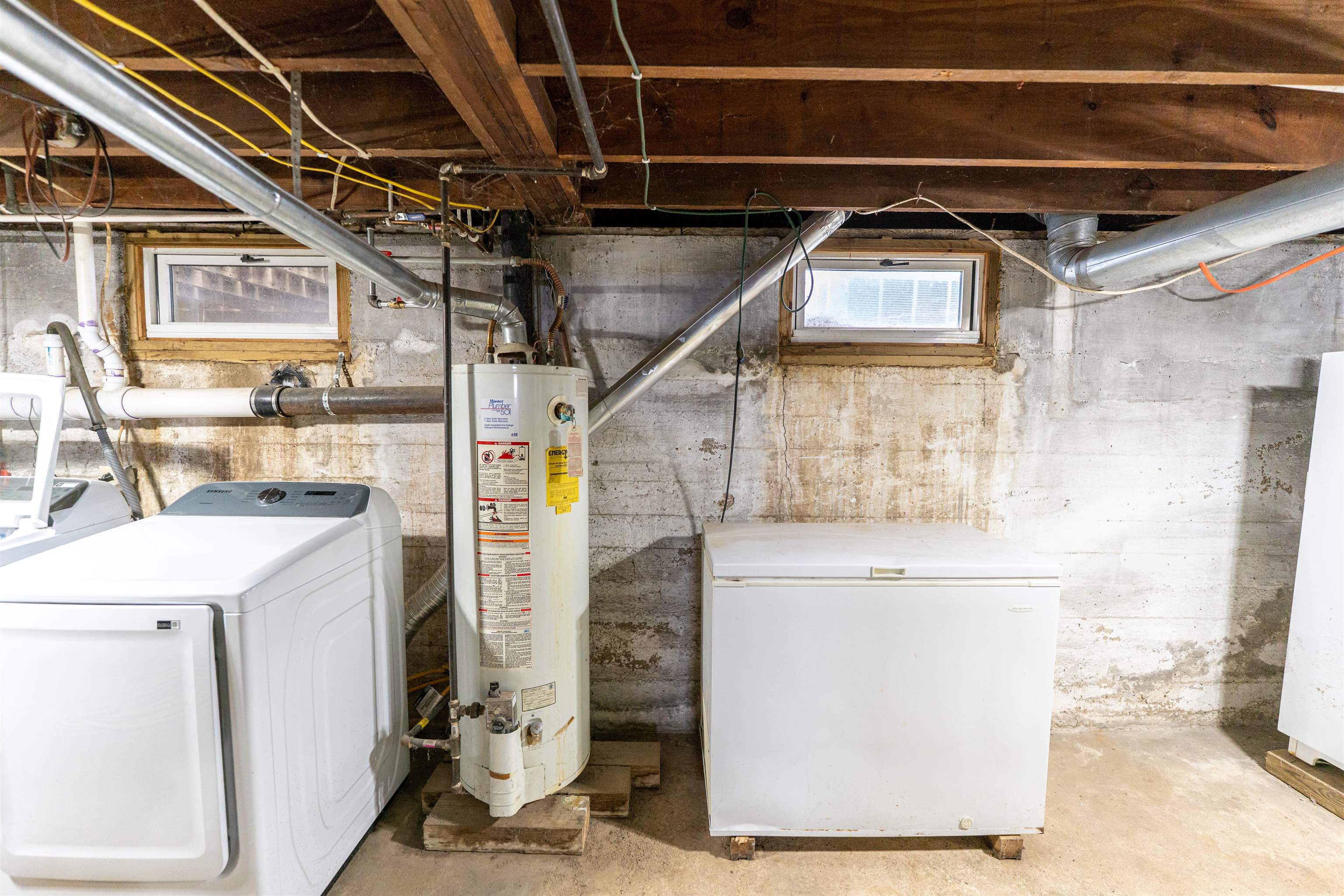 7965 North Adeline Road Leaf River, IL 61047 - Photo 40 of 90 a utility room with dryer and washer