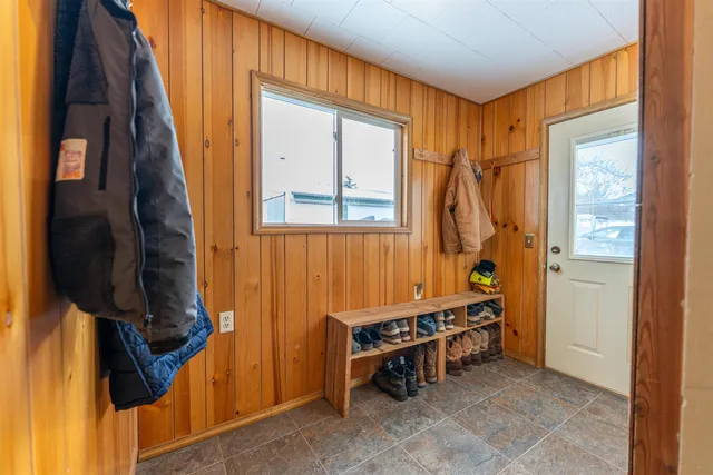 a bathroom with a sink vanity granite and toilet