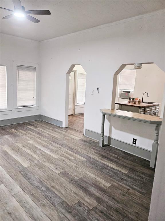 10250 Southeast 108th Terrace Road Ocala, FL 34472 - Photo 4 of 11 a view of a livingroom with wooden floor