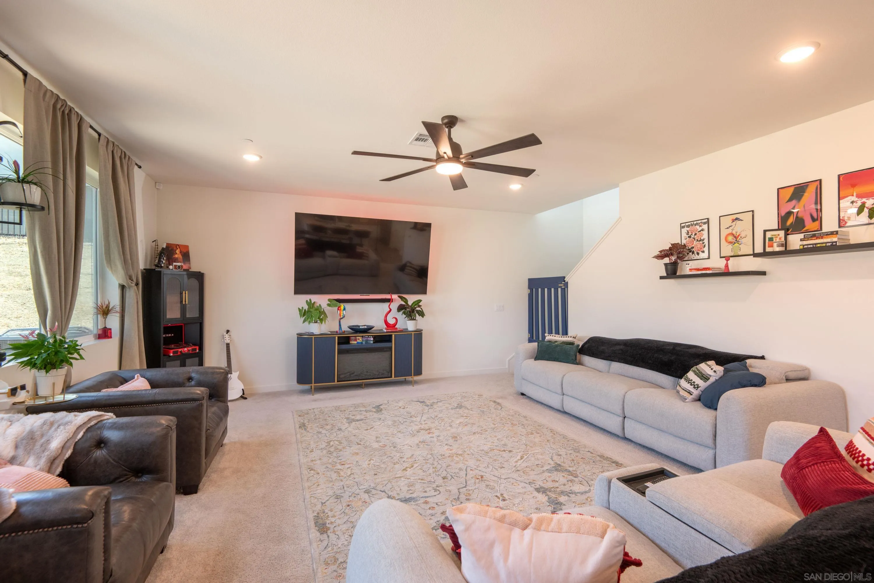 35177 Orchard Trail Fallbrook, CA 92028 - Photo 11 of 31 a living room with furniture and a flat screen tv