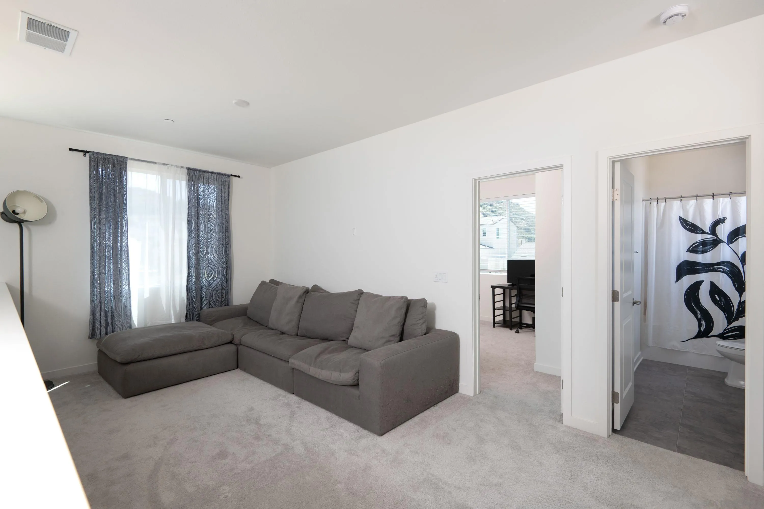 35177 Orchard Trail Fallbrook, CA 92028 - Photo 14 of 31 a living room with furniture and a flat screen tv