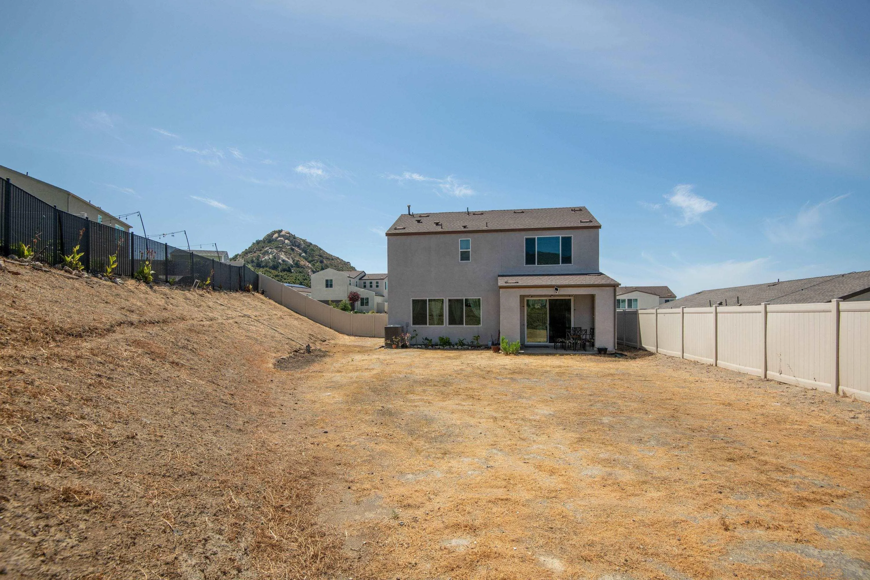 35177 Orchard Trail Fallbrook, CA 92028 - Photo 24 of 31 a view of a house with a snow in front of yard