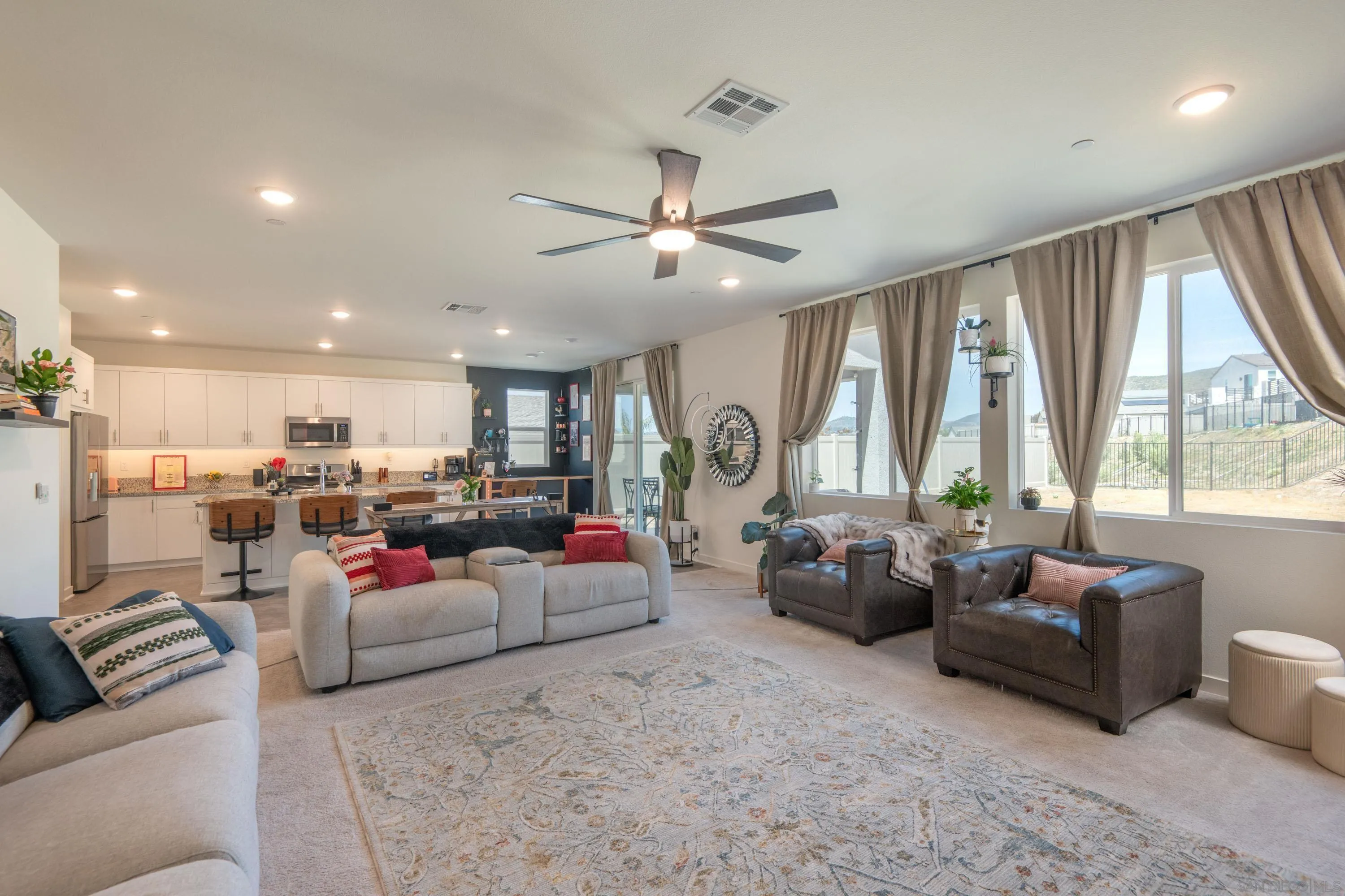 35177 Orchard Trail Fallbrook, CA 92028 - Photo 10 of 31 a living room with furniture and a large window
