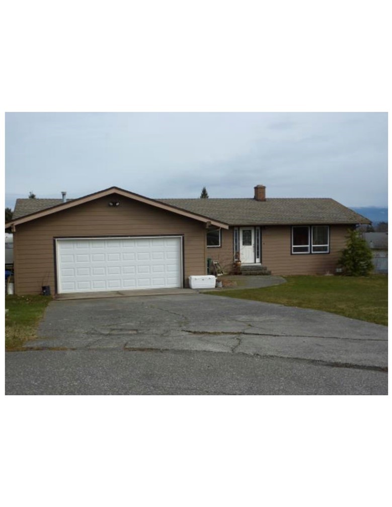 a black and white photo of a house