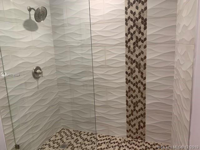 1900 St Andrews Road, Unit 134 Hollywood, FL 33021 - Photo 14 of 29 Beautifully redone master shower with glass doors