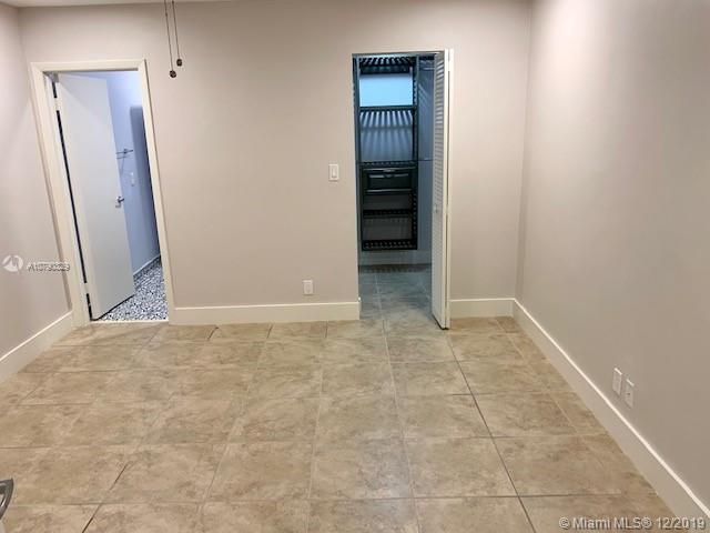 1900 St Andrews Road, Unit 134 Hollywood, FL 33021 - Photo 16 of 29 2nd bedroom with huge walk in closet and bathroom