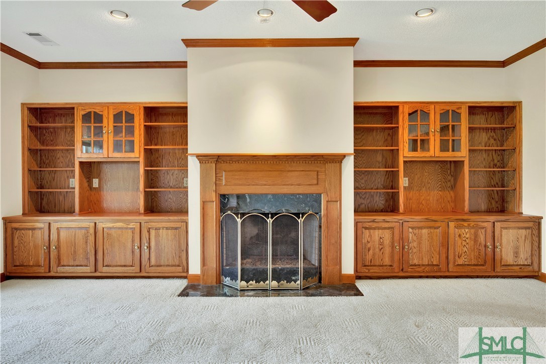 119 Riverview Road Savannah, GA 31410 - Photo 12 of 43 Fireplace & bookcasing