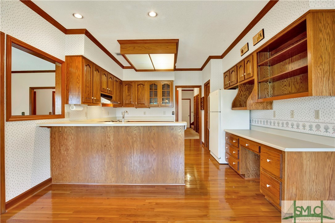 119 Riverview Road Savannah, GA 31410 - Photo 15 of 43 Kitchen with desk and shelving