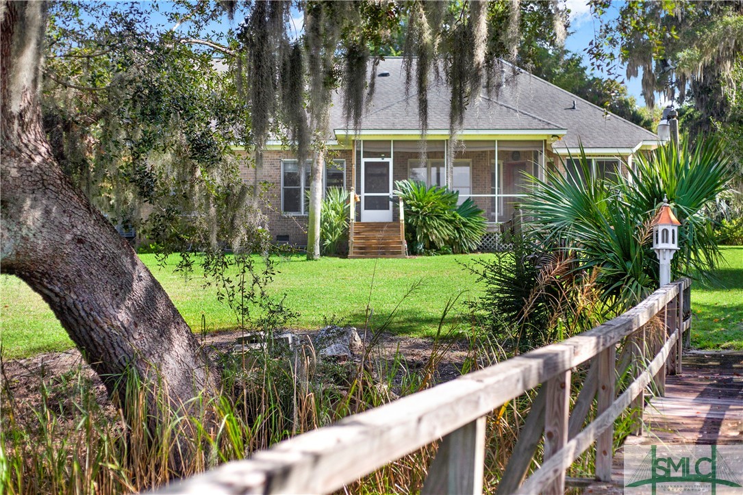 119 Riverview Road Savannah, GA 31410 - Photo 36 of 43 Back from dock walk