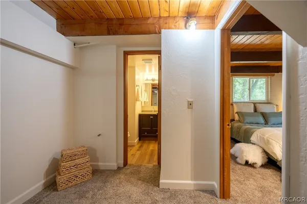 a room that has a bed and a window
