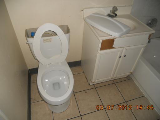 7108 South Normal Boulevard Chicago, IL 60621 - Photo 15 of 15 a utility room with dryer and washer