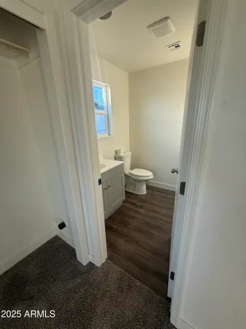 a bathroom with a sink and a toilet