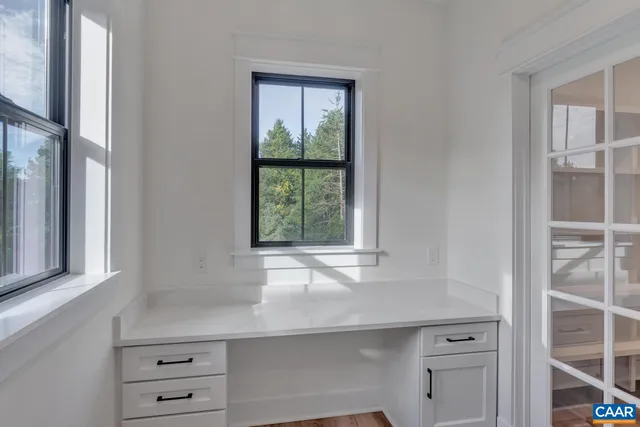 a kitchen that has a sink and a stove