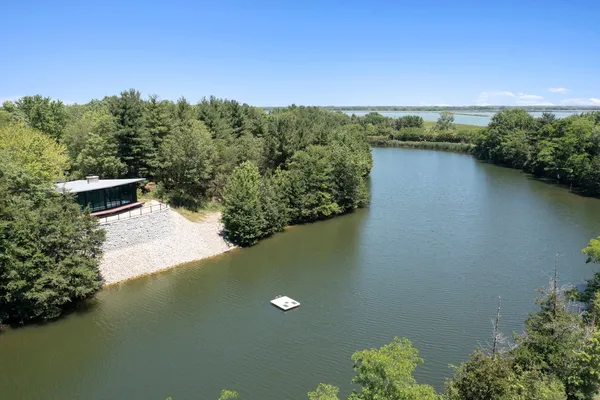 a view of lake with green space