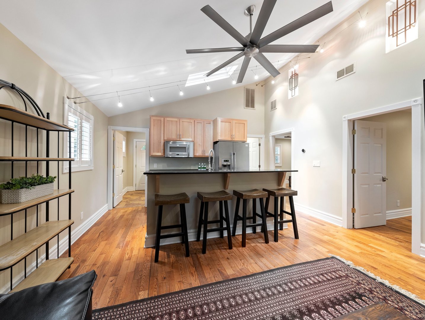 7750 Pine Bluff Road Morris, IL 60450 - Photo 23 of 46 a view of a dining room with furniture a rug and wooden floor