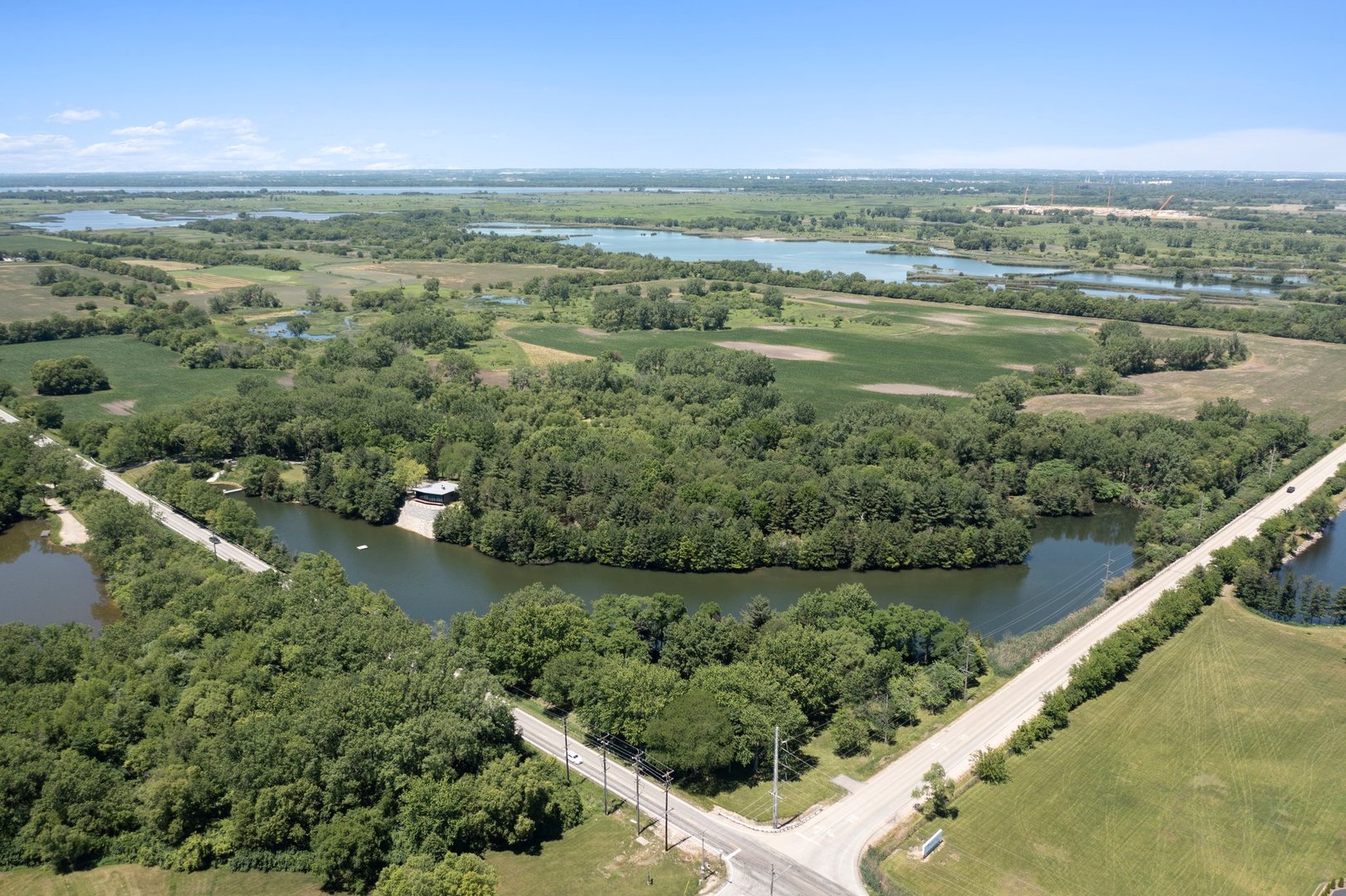7750 Pine Bluff Road Morris, IL 60450 - Photo 45 of 46 a view of a lake with a mountain