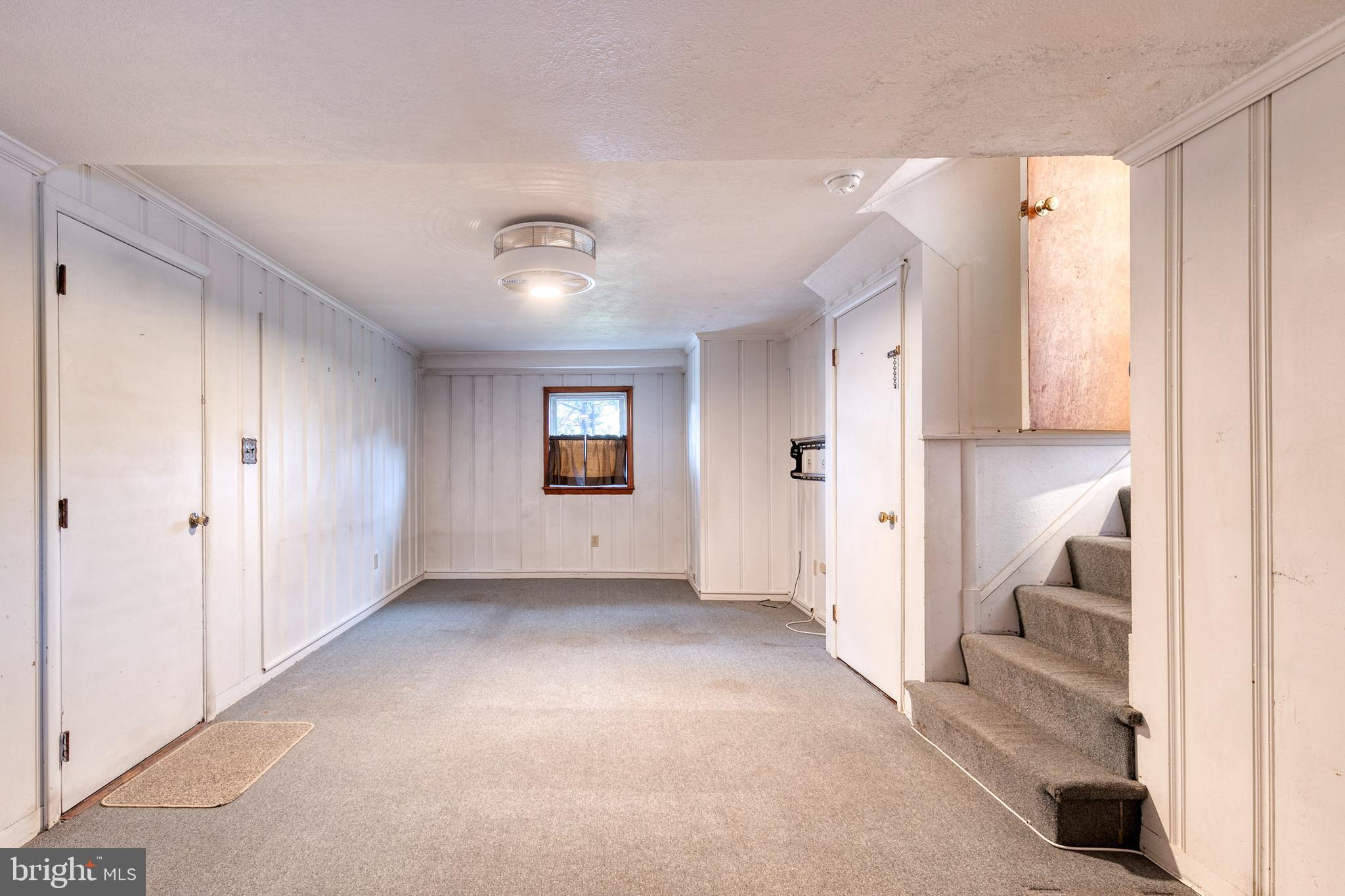 207 Garden Road Towson, MD 21286 - Photo 32 of 32 Den minus staging