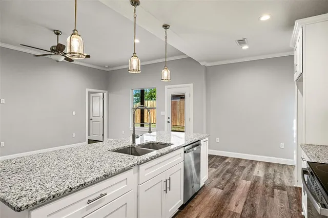 a bathroom with a sink double vanity and a mirror