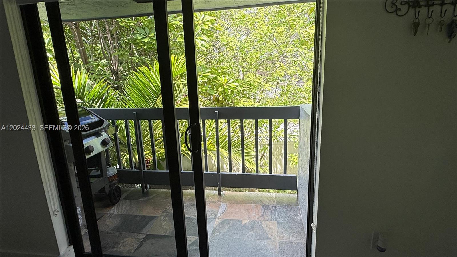 13675 Southwest 62nd Street, Unit 2023 Miami, FL 33183 - Photo 4 of 22 a view of an entryway