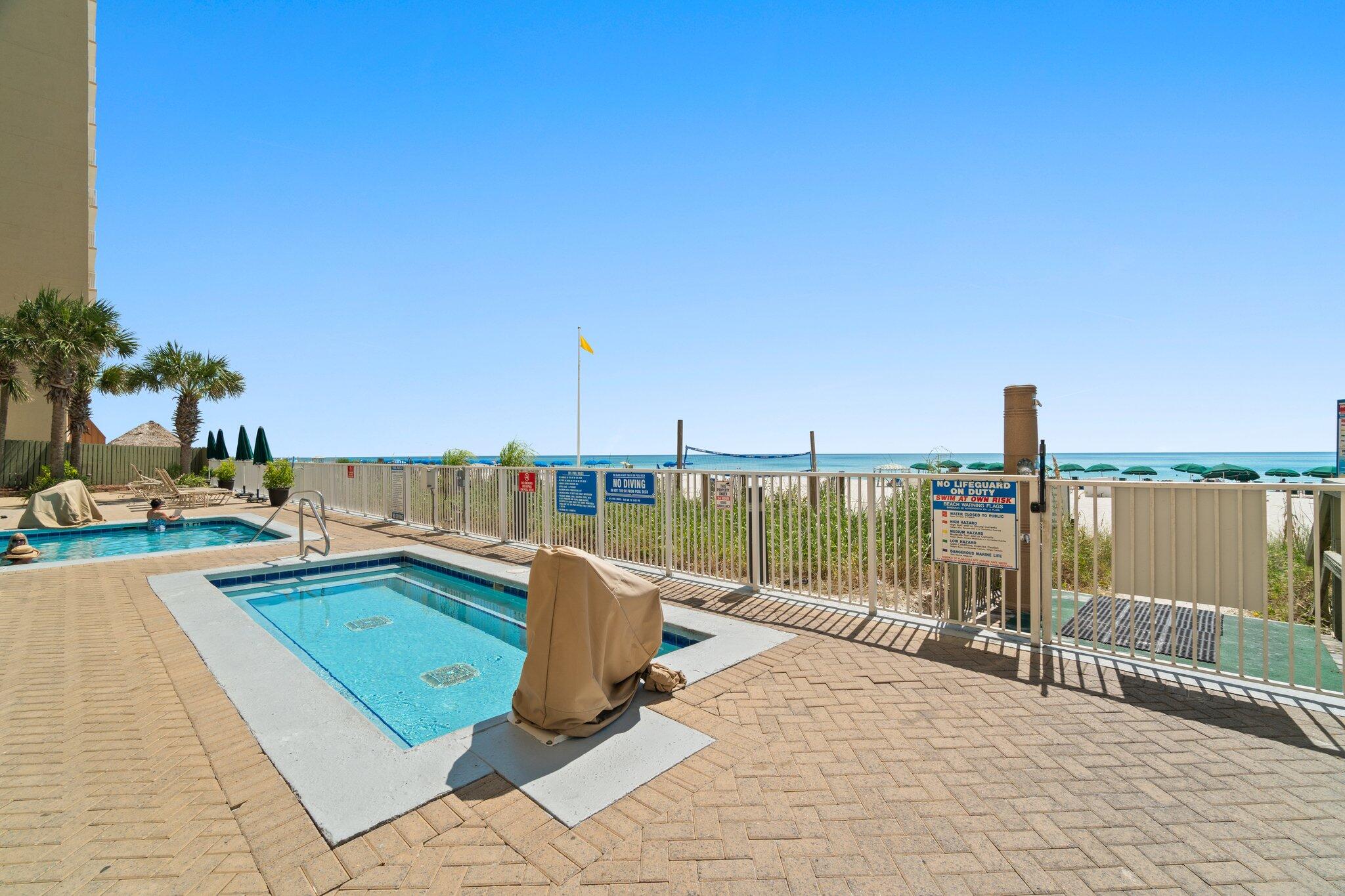 17545 Front Beach Road, Unit 2103 Panama City Beach, FL 32413 - Photo 37 of 56 a view of a lake with a terrace