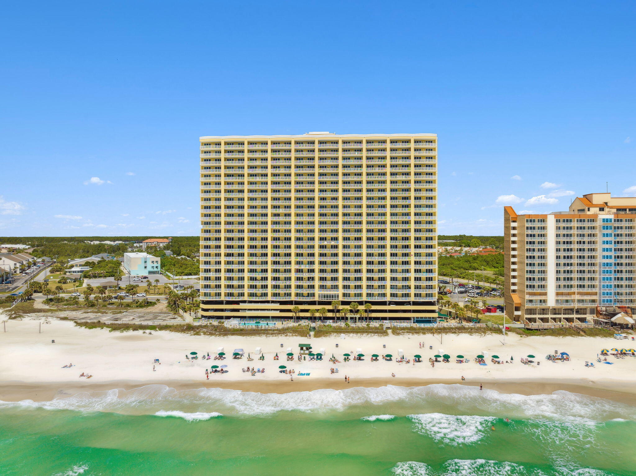 17545 Front Beach Road, Unit 2103 Panama City Beach, FL 32413 - Photo 49 of 56 a view of a building with a yard