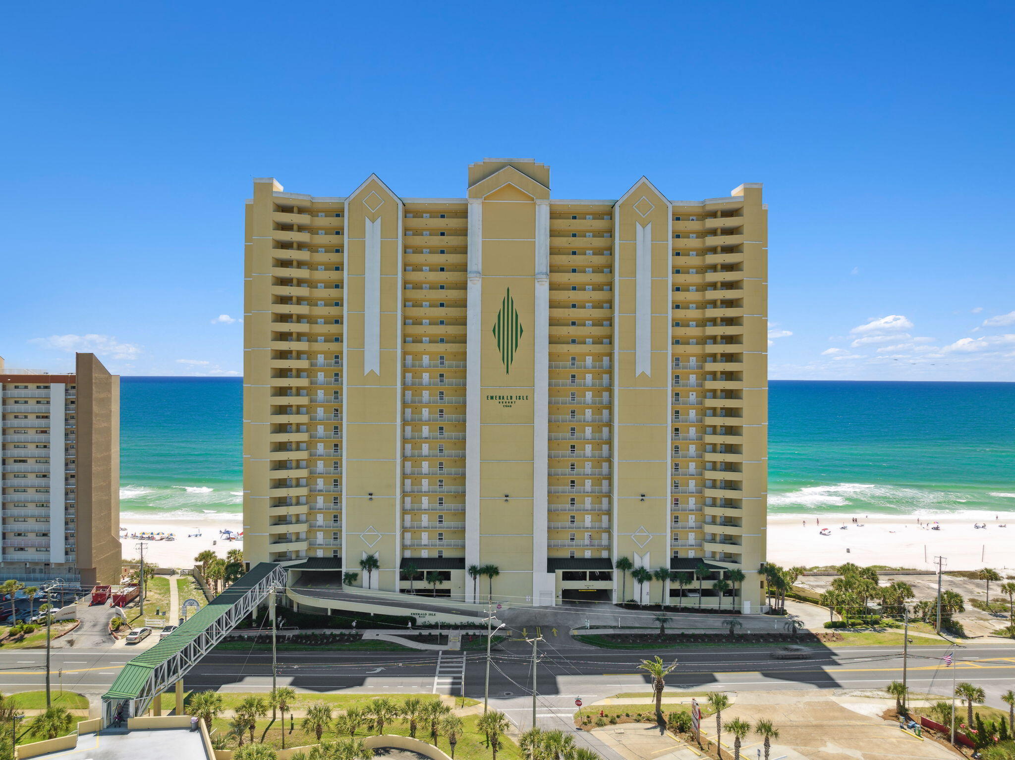 17545 Front Beach Road, Unit 2103 Panama City Beach, FL 32413 - Photo 50 of 56 a view of a large building with a lawn chairs