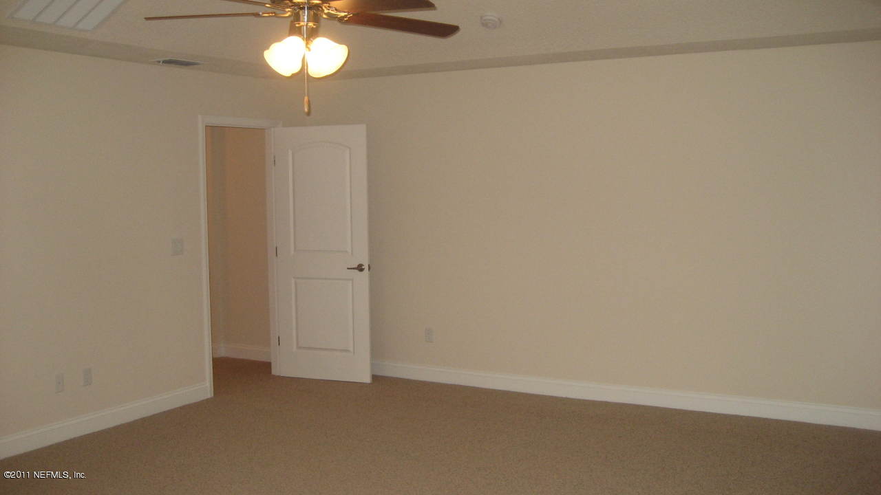 2988 Longleaf Ranch Circle Middleburg, FL 32068 - Photo 16 of 19 Master Bedroom