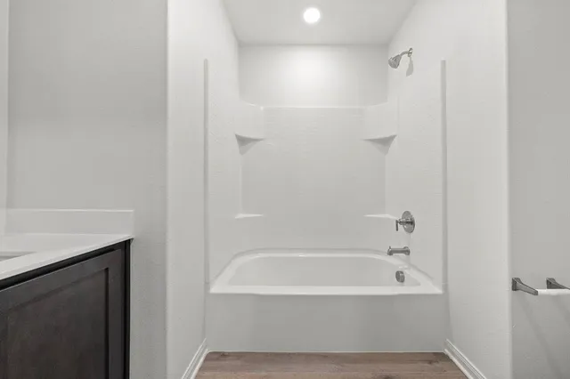 a bathroom with a bathtub