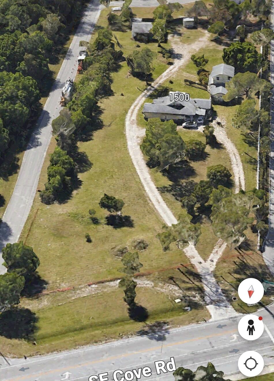 1500 Southeast Cove Road Stuart, FL 34997 - Photo 24 of 28 an aerial view of a house with a yard