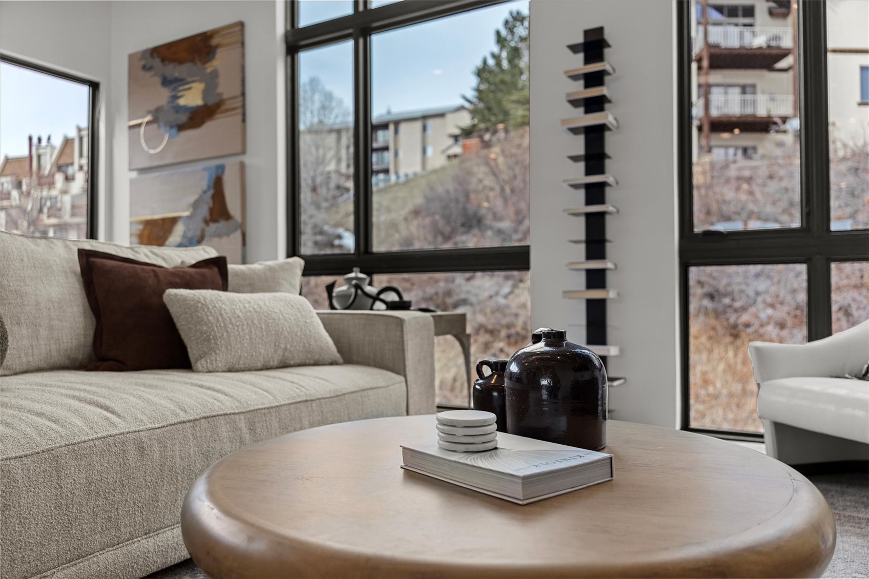 1855 Burgess Creek Road, Unit 3 Steamboat Springs, CO 80487 - Photo 22 of 50 a living room with furniture and a large window