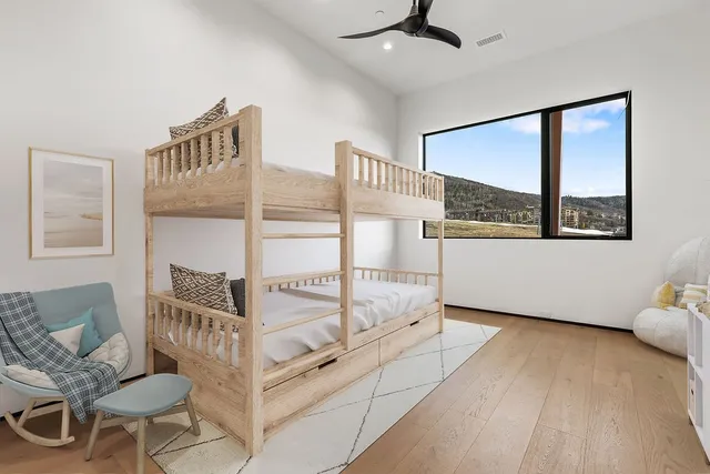 a view of a livingroom with furniture and windows