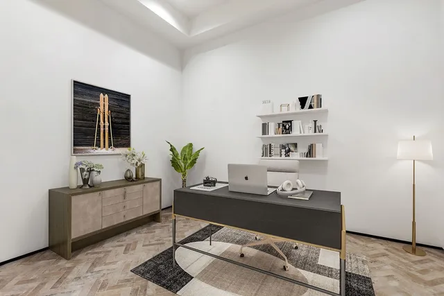 a living room with furniture and window