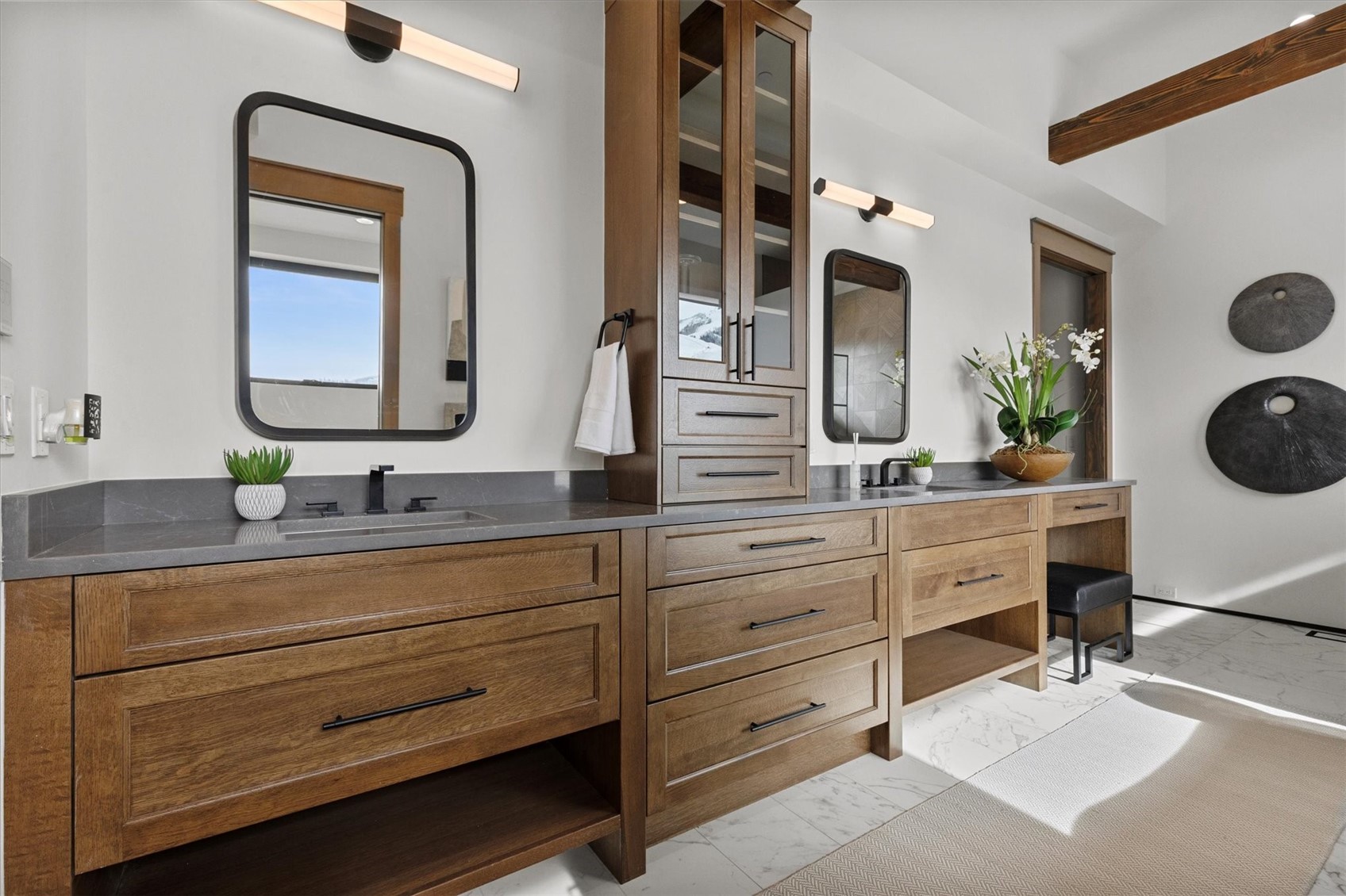1855 Burgess Creek Road, Unit 3 Steamboat Springs, CO 80487 - Photo 29 of 50 a bathroom with a sink and a mirror
