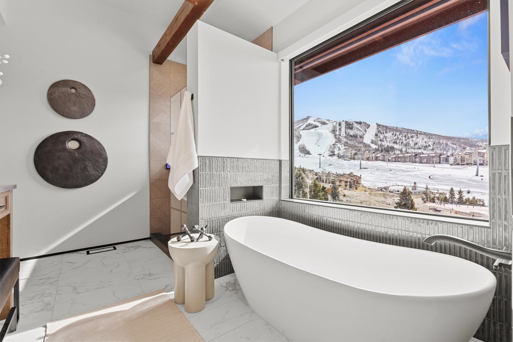 1855 Burgess Creek Road, Unit 3 Steamboat Springs, CO 80487 - Photo 30 of 50 a bathroom with a bathtub and a window