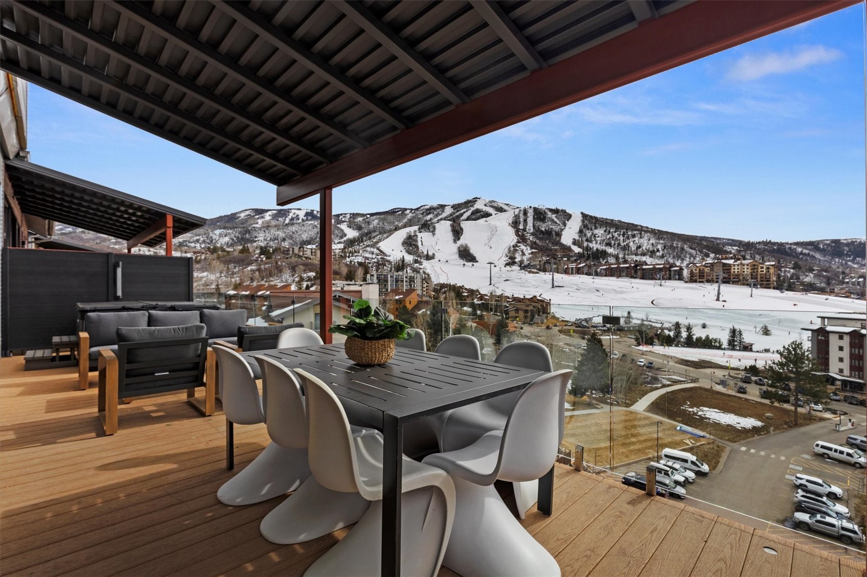 1855 Burgess Creek Road, Unit 3 Steamboat Springs, CO 80487 - Photo 5 of 50 a view of a chairs and table in patio