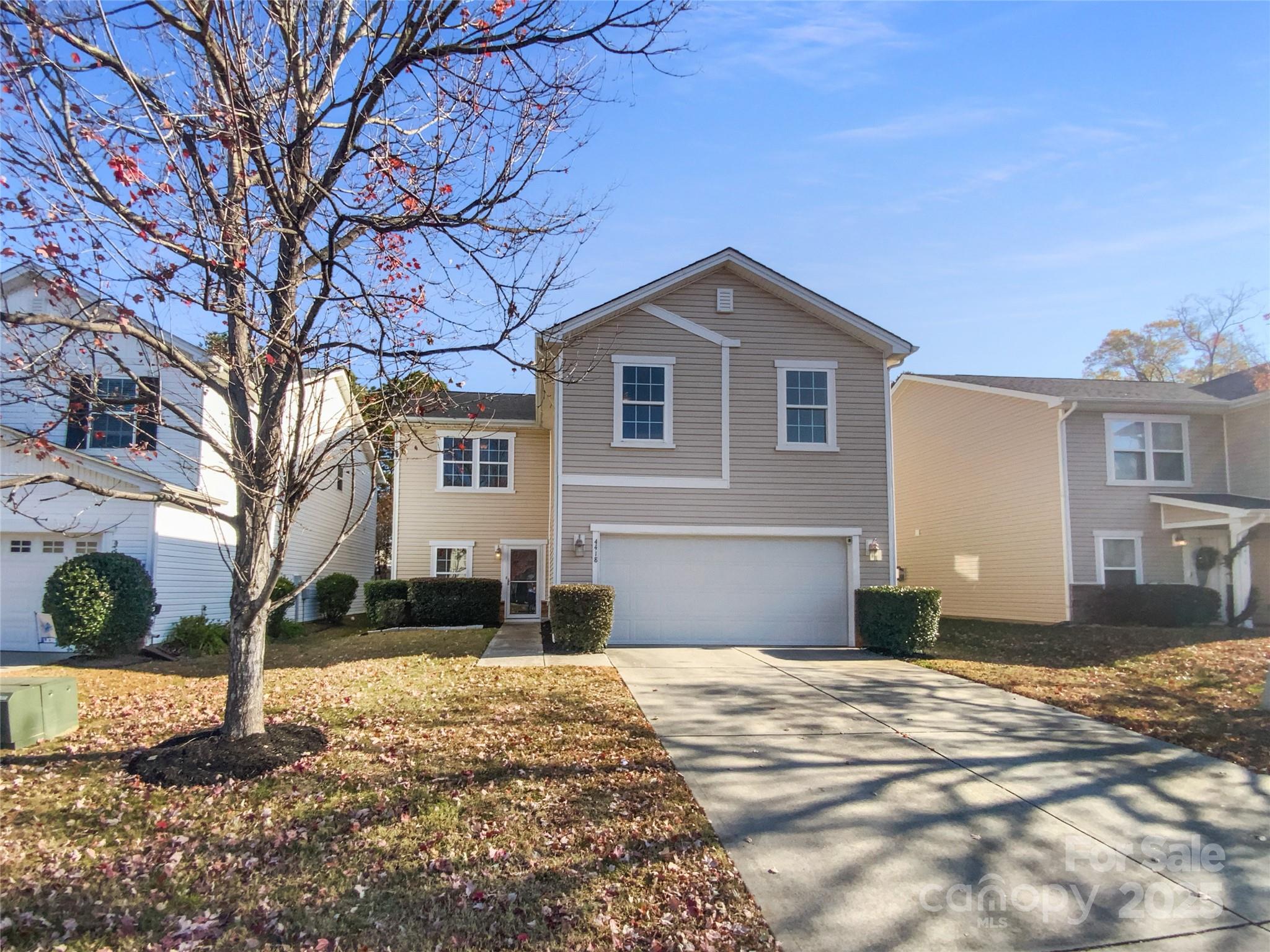 4418 Kiddle Lane Monroe, NC 28110 - Photo 17 of 19 a front view of a house with a yard