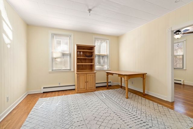 a room with furniture and a window