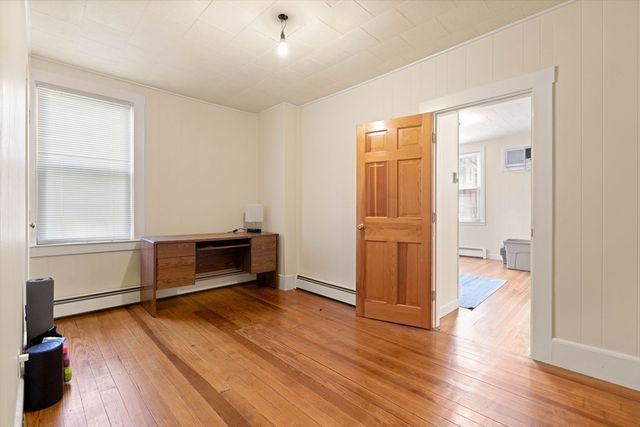 wooden floor and windows in a room