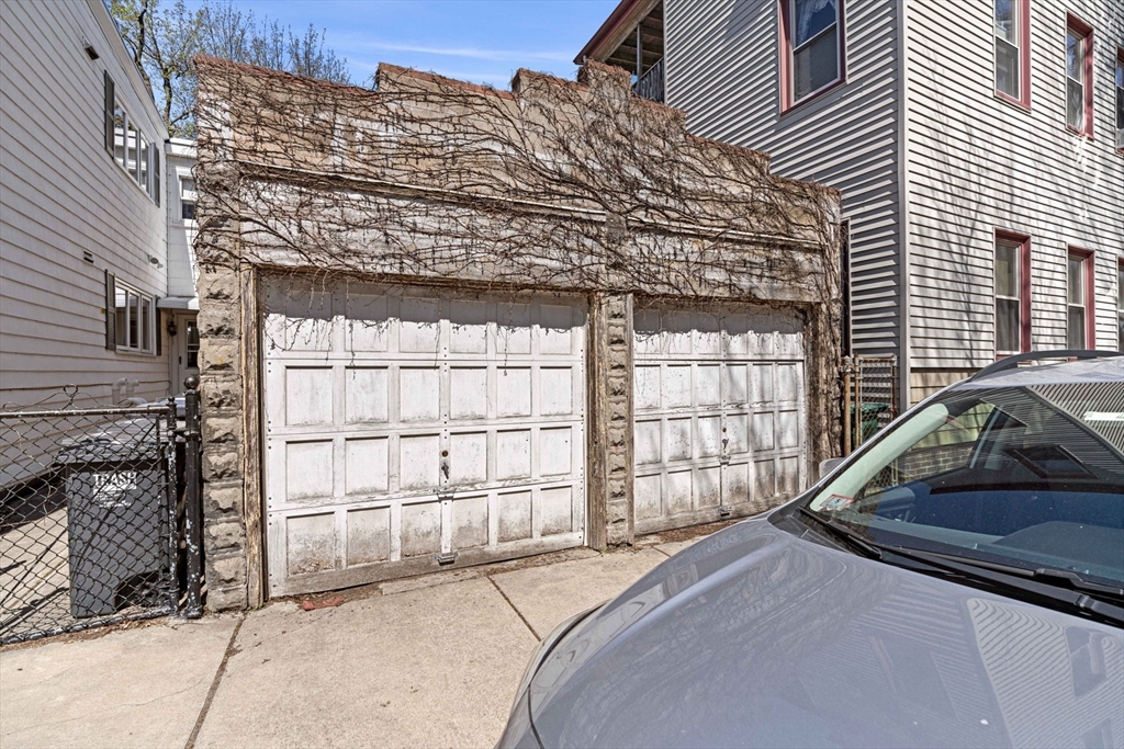 59 7th Street Cambridge, MA 02141 - Photo 23 of 26 a view of a car park in front of house