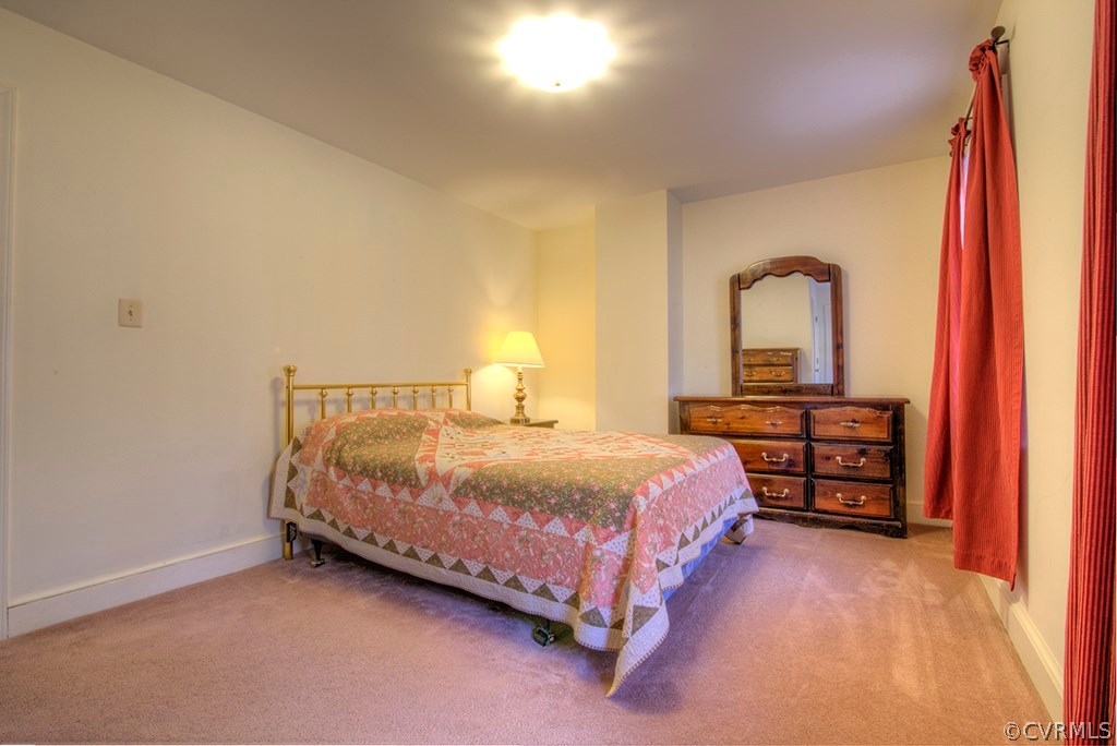 6321 Glebe Point Road Chesterfield, VA 23838 - Photo 15 of 23 a bedroom with a bed and a cabinets