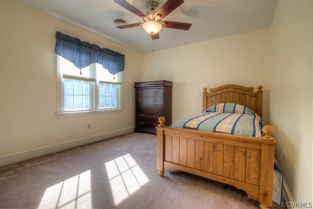 6321 Glebe Point Road Chesterfield, VA 23838 - Photo 16 of 23 a view of a livingroom with a ceiling fan