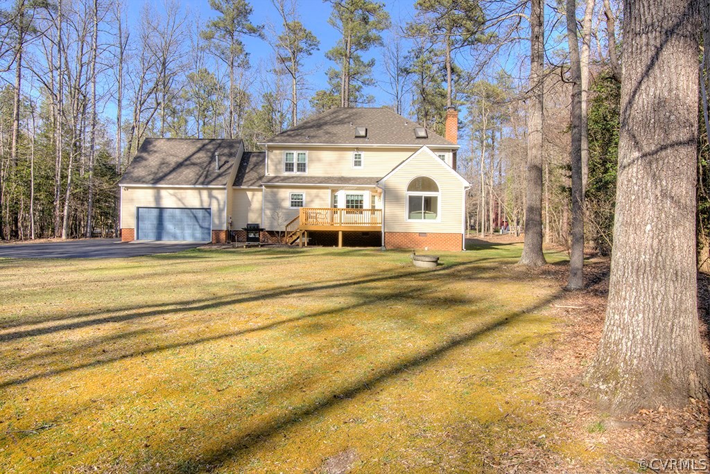 6321 Glebe Point Road Chesterfield, VA 23838 - Photo 21 of 23 a view of a house with a large trees and a big yard