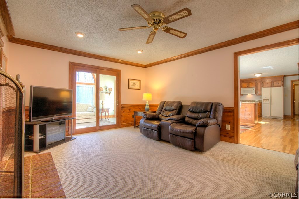 6321 Glebe Point Road Chesterfield, VA 23838 - Photo 5 of 23 a living room with furniture and a flat screen tv