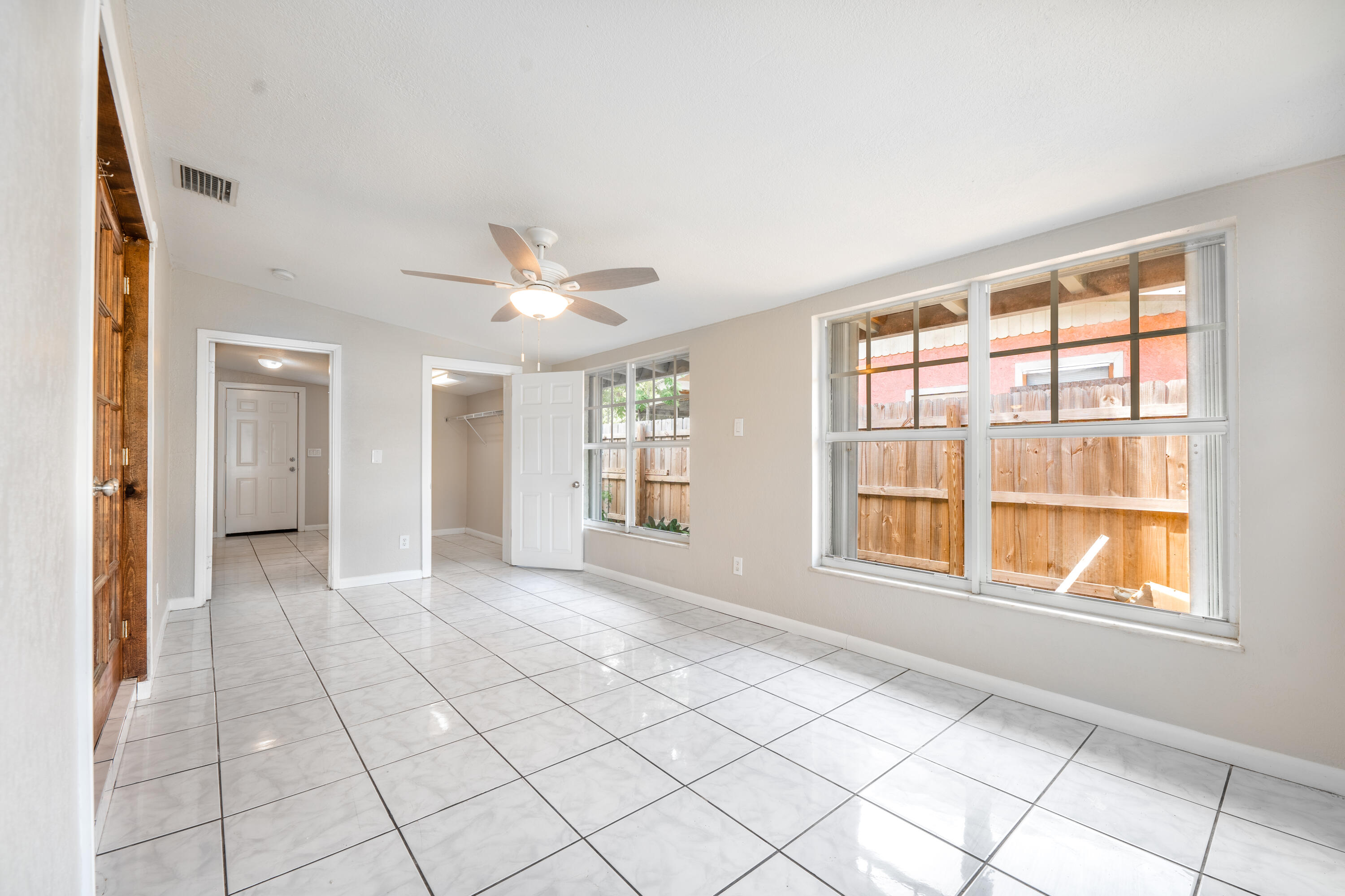 1219 South 10th Street Fort Pierce, FL 34950 - Photo 12 of 29 a view of an empty room with a window