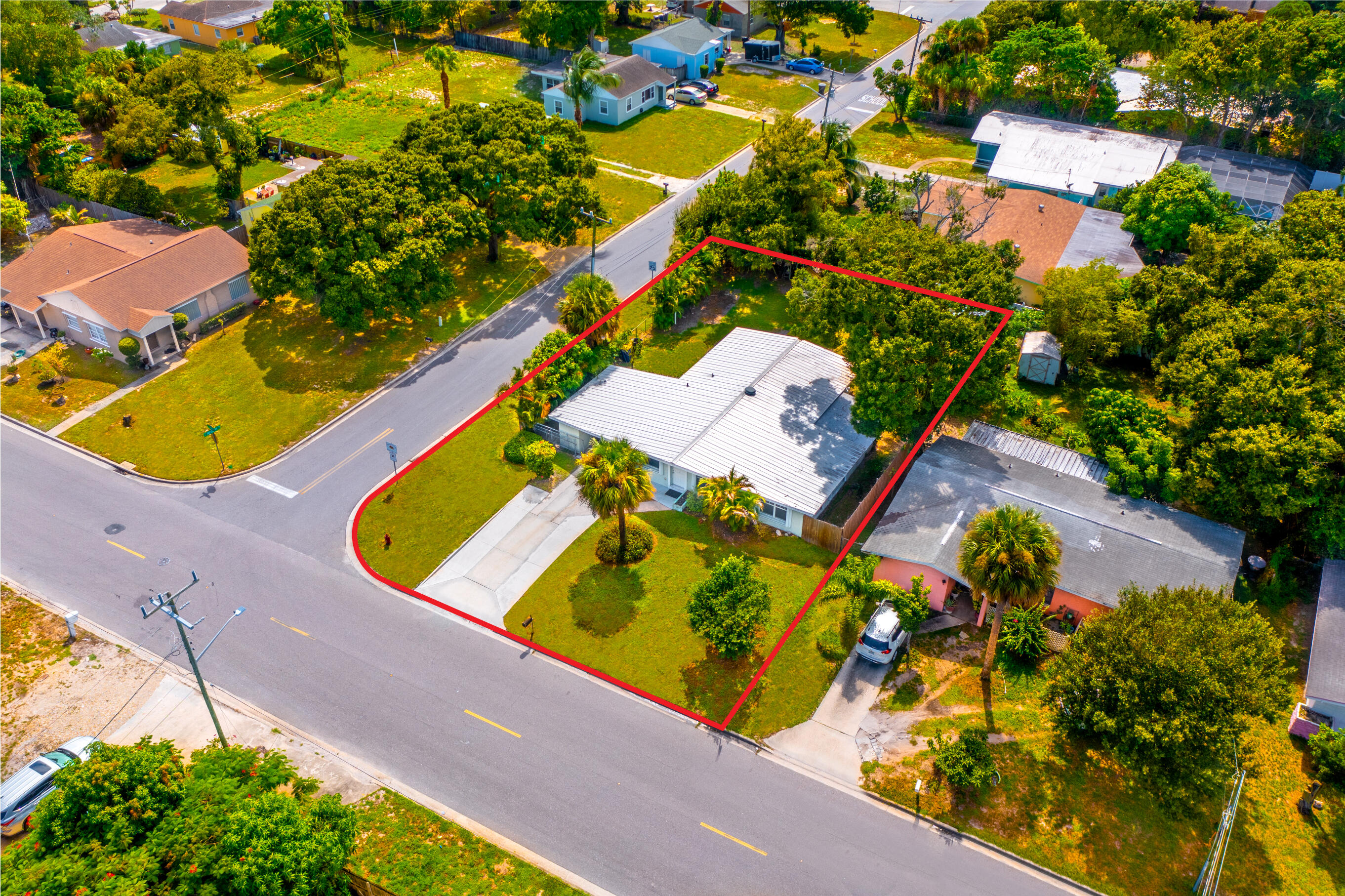 1219 South 10th Street Fort Pierce, FL 34950 - Photo 29 of 29 an aerial view of a swimming pool with outdoor seating and yard